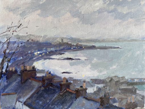 View across Newlyn rooftops to the sea and Penzance