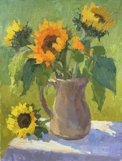 Sunflowers in a vase in the garden